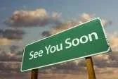 6394892-see-you-soon-green-road-sign-with-dramatic-clouds-and-sky.webp
