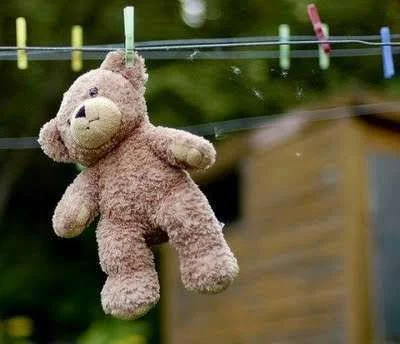 bad-teddy-bear-hanging-clothes-line.webp