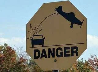 caution-planes-funny-sign.webp
