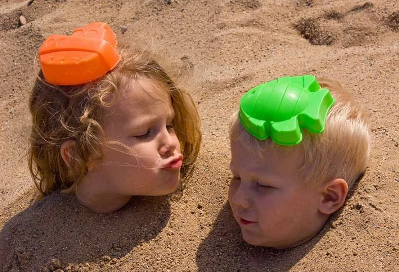 children in sand.webp