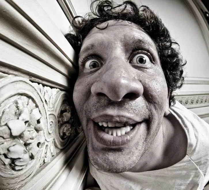 crazy-guy-in-straight-jacket.webp