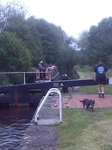 Graham and Saffi help at the lock.webp