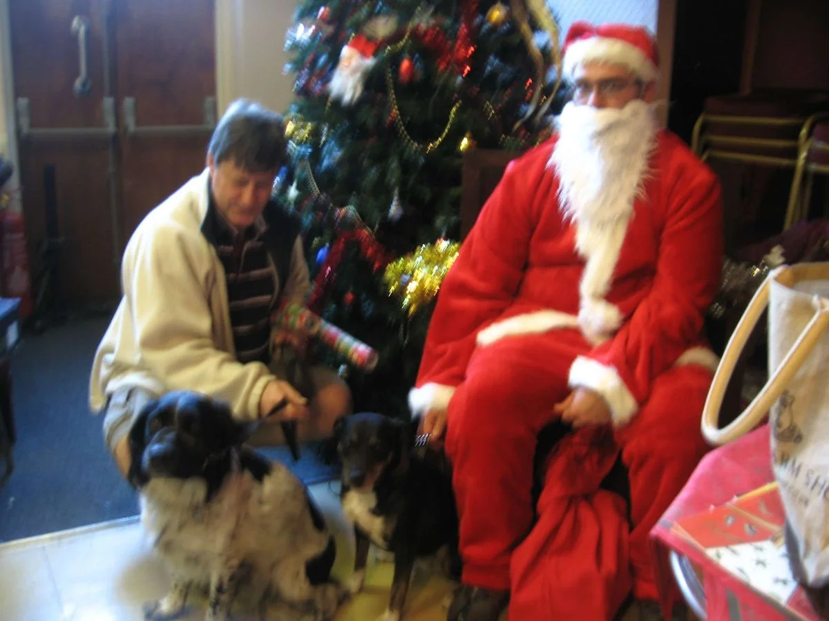 Max and Saffi with Santa.webp
