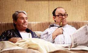 Morecombe and wise in bed.webp