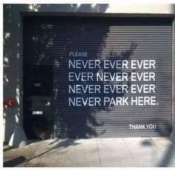 never-park-funny-sign.webp