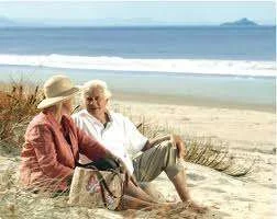 old man & woman on vacation.webp