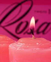 pink candle lit.webp