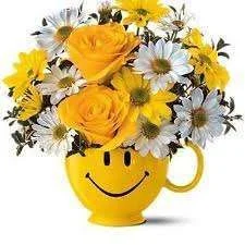 Smiley mug with yellow flowers.webp