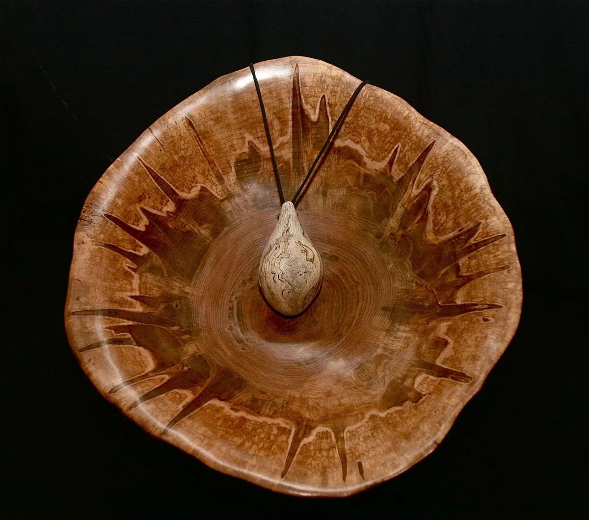 Spider hearted maple bowl with amulet.webp
