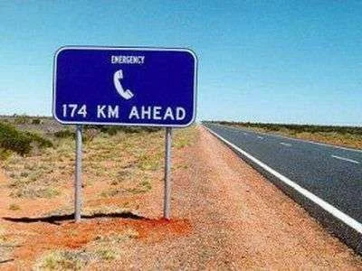 telephone-ahead-funny-sign.webp