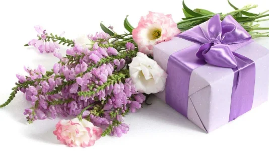 Holidays___International_Womens_Day_Bouquet_of_flowers_and_a_gift_for_a_girl_on_March_8_057125_.webp