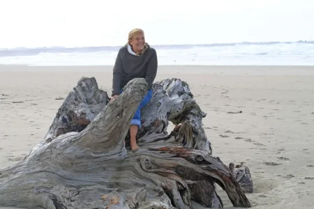 Deb on stump.webp