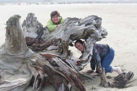 Karen and Sam behind stump_edited-1.webp