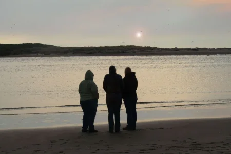 Karen Sam Deb at sunset on beach_edited-1.webp